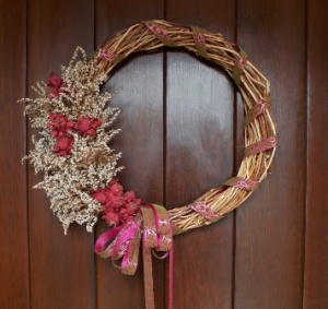 A Trumpet vine wreath decorates for season